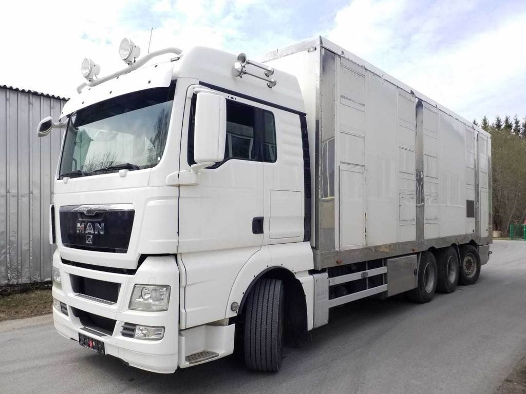 MAN TGX 35.540 8X4 TRIDEM ANIMAL - Для перевезення худоби вантажівка: фото 1 MAN TGX 35.540 8X4 TRIDEM ANIMAL - Для перевезення худоби вантажівка: фото 1