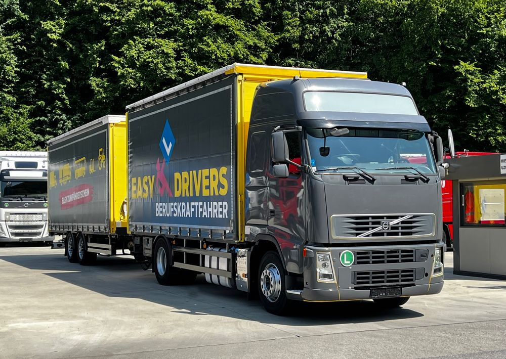 Volvo FH 420 4x2 // Zestaw + przyczepa Schwarzmuller // Jak Nowy // Niski przebieg // Automat // Idealny !!! - Тентована вантажівка: фото 1 Volvo FH 420 4x2 // Zestaw + przyczepa Schwarzmuller // Jak Nowy // Niski przebieg // Automat // Idealny !!! - Тентована вантажівка: фото 1