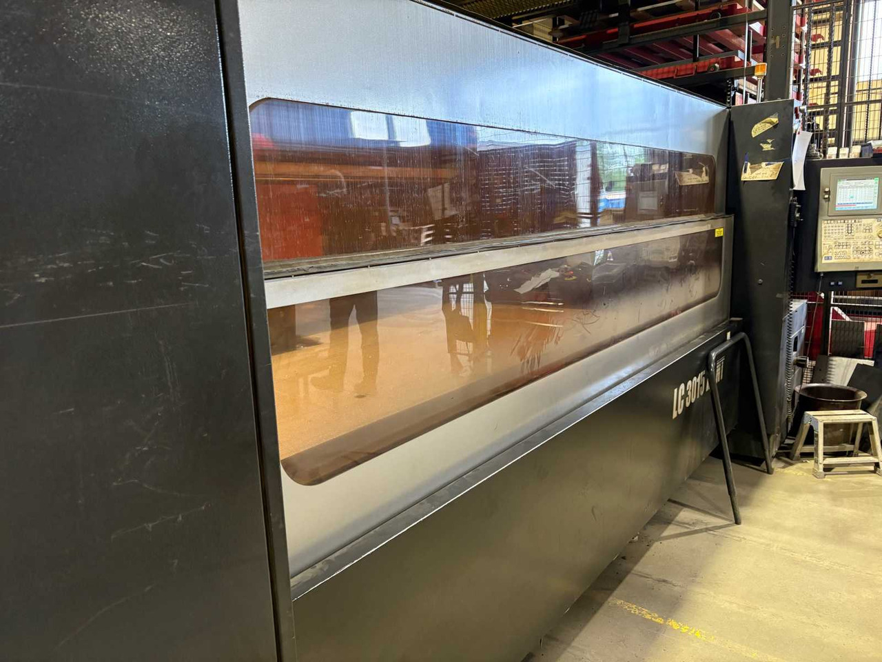 CNC Controlled CO2 Laser Cutting Machine Amada LC 3015 X1 NT - Металообробний верстат: фото 3 CNC Controlled CO2 Laser Cutting Machine Amada LC 3015 X1 NT - Металообробний верстат: фото 3
