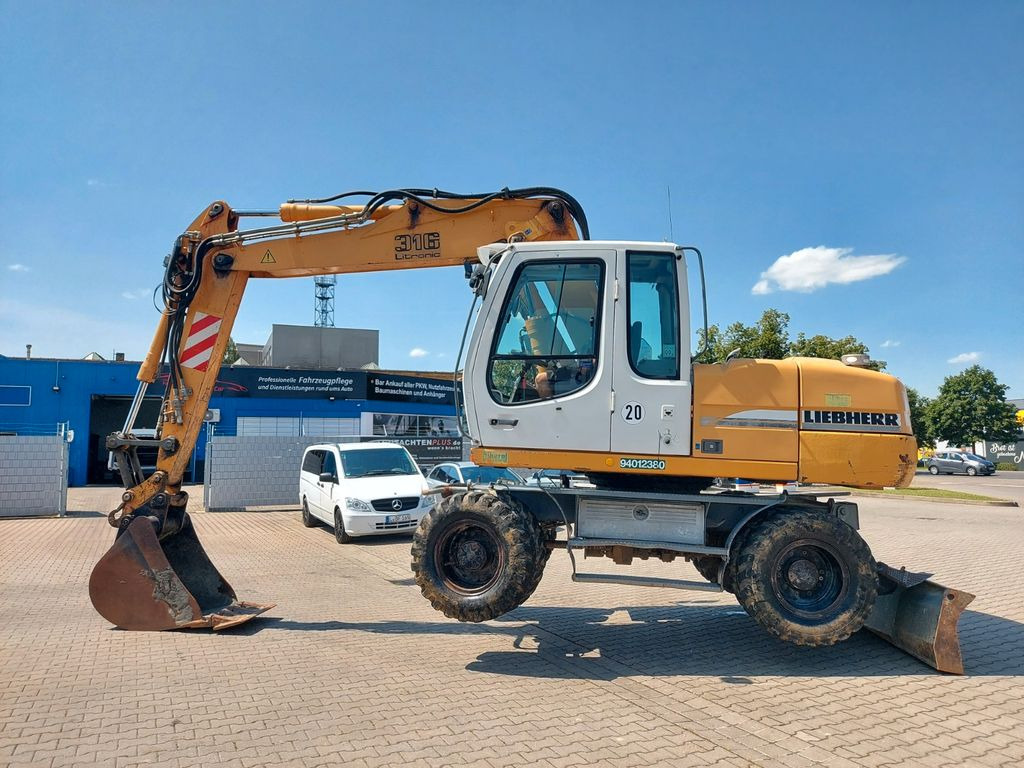 Liebherr A 316 LITRONIC TL + 2005 DEUTZ 13400 STD. - Колісний екскаватор: фото 2 Liebherr A 316 LITRONIC TL + 2005 DEUTZ 13400 STD. - Колісний екскаватор: фото 2