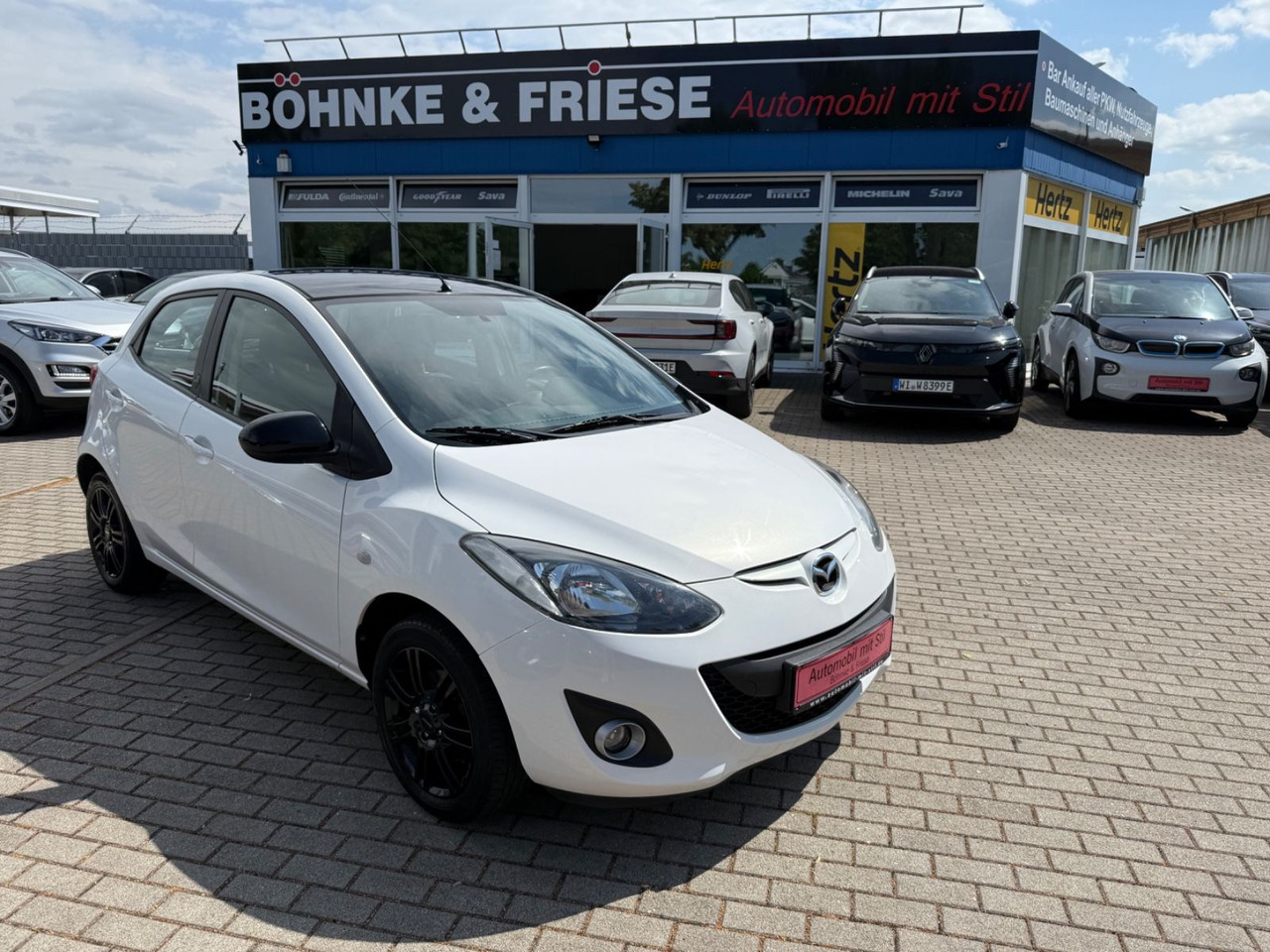 Mazda 2 Lim. 1.3 Origami 5 TÜER KLIMA SHZ TÜV NEU - Легковий автомобіль: фото 1 Mazda 2 Lim. 1.3 Origami 5 TÜER KLIMA SHZ TÜV NEU - Легковий автомобіль: фото 1