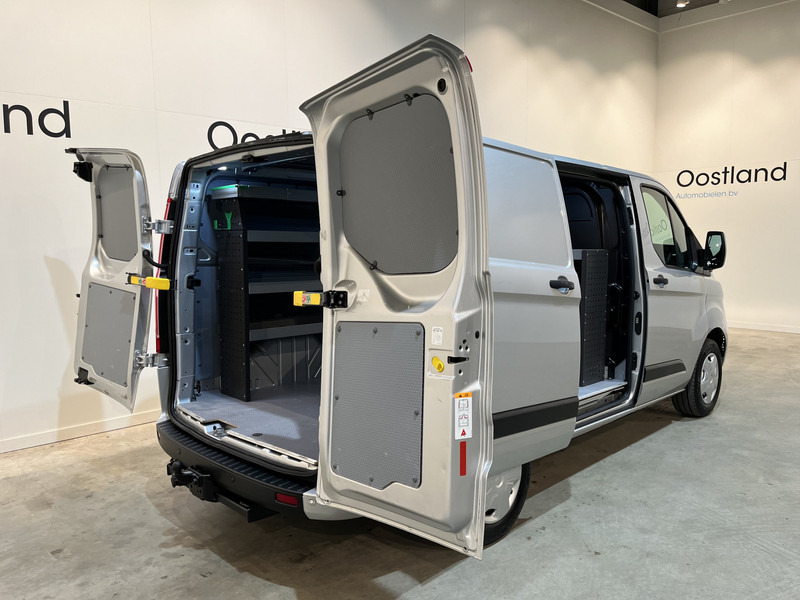 Ford Transit Custom 280 2.0 TDCI L1H1 Trend 130 PK Servicebus / Inrichting / Euro 6 / Airco / PDC / Cruise Control / Navigatie / CarPlay / Trekhaak / 3-Zits / 96.300 KM !! / BPM VRIJ !! - Легковий фургон: фото 2 Ford Transit Custom 280 2.0 TDCI L1H1 Trend 130 PK Servicebus / Inrichting / Euro 6 / Airco / PDC / Cruise Control / Navigatie / CarPlay / Trekhaak / 3-Zits / 96.300 KM !! / BPM VRIJ !! - Легковий фургон: фото 2