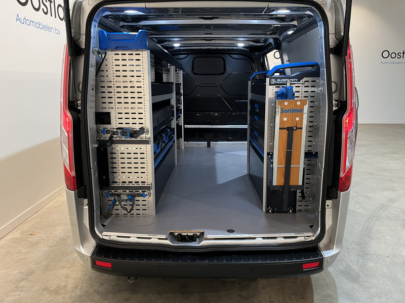 Ford Transit Custom 300 2.0 TDCI L2H1 Trend 130 PK Servicebus / Sortimo Inrichting / Euro 6 / Airco / Cruise Control / Klep / PDC / 3-Zits - Легковий фургон: фото 4 Ford Transit Custom 300 2.0 TDCI L2H1 Trend 130 PK Servicebus / Sortimo Inrichting / Euro 6 / Airco / Cruise Control / Klep / PDC / 3-Zits - Легковий фургон: фото 4