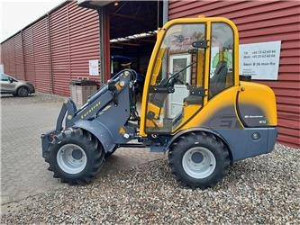 Eurotrac W12S med førerhus, skovl og gafler  - Колісний навантажувач: фото 1 Eurotrac W12S med førerhus, skovl og gafler  - Колісний навантажувач: фото 1