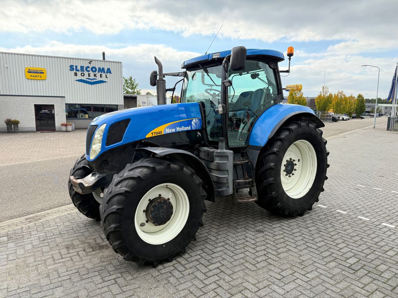 New Holland T7040 Power Command - Трактор: фото 1 New Holland T7040 Power Command - Трактор: фото 1