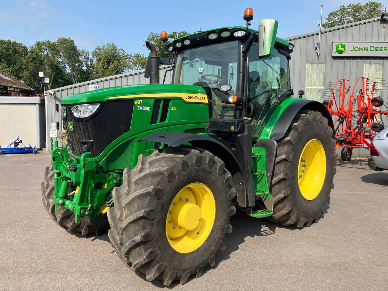 John Deere 6R 215 - Трактор: фото 1 John Deere 6R 215 - Трактор: фото 1