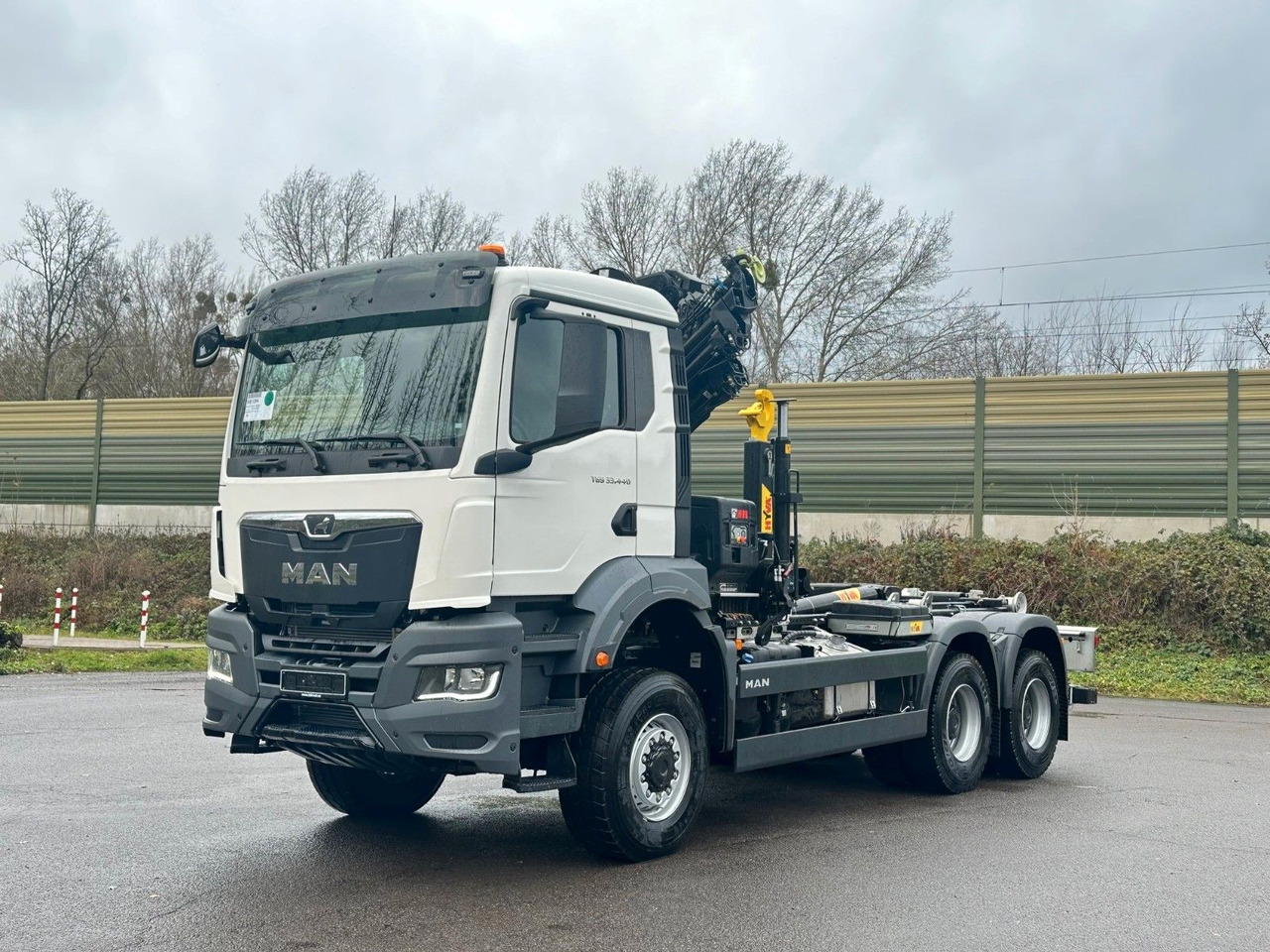 MAN TGS 33.440 6x6 BB Abrollkipper+Kran Hiab 228-6 - Гаковий мультиліфт вантажівка, Вантажівка з маніпулятором: фото 2 MAN TGS 33.440 6x6 BB Abrollkipper+Kran Hiab 228-6 - Гаковий мультиліфт вантажівка, Вантажівка з маніпулятором: фото 2