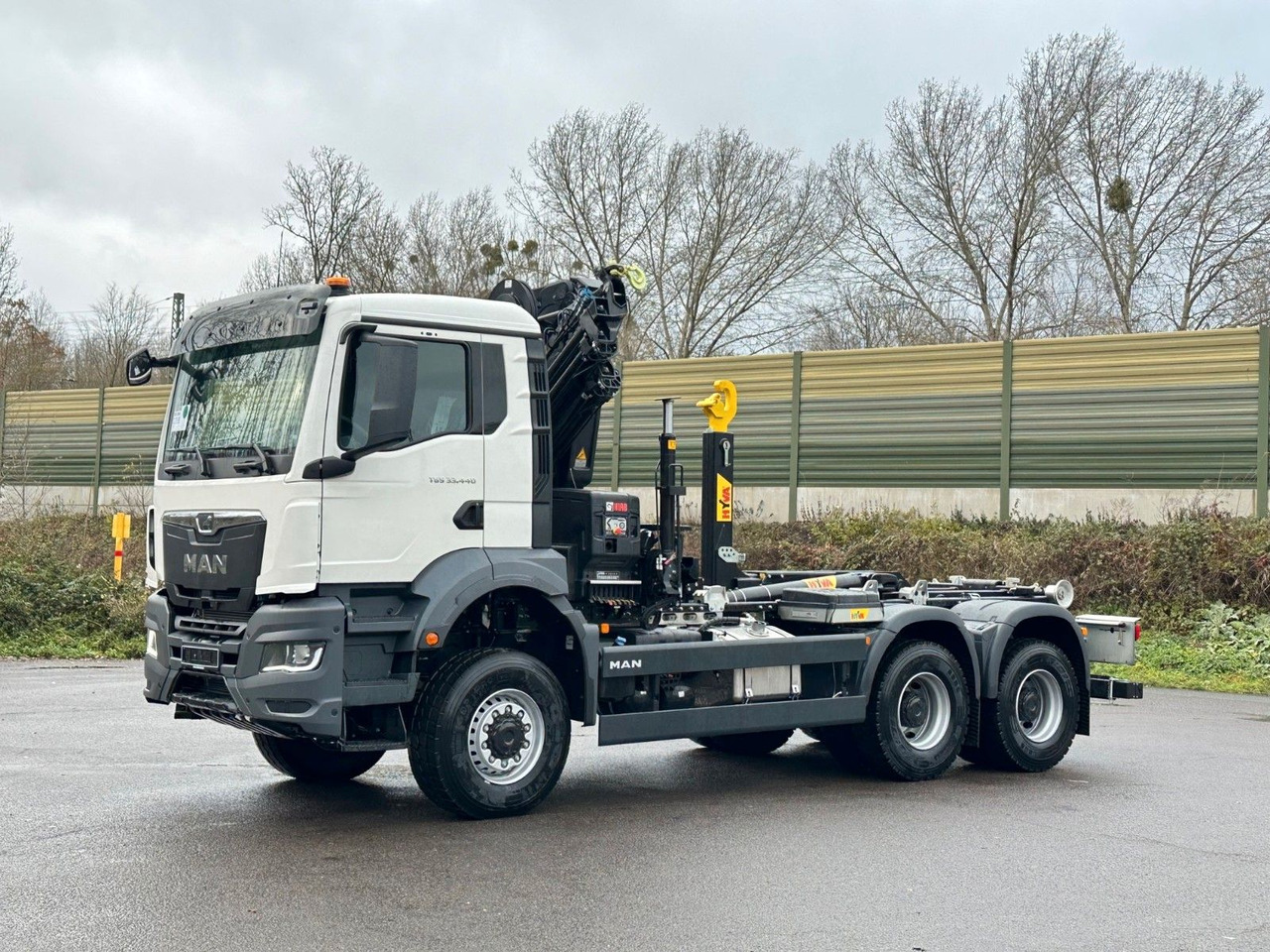 MAN TGS 33.440 6x6 BB Abrollkipper+Kran Hiab 228-6 - Гаковий мультиліфт вантажівка, Вантажівка з маніпулятором: фото 3 MAN TGS 33.440 6x6 BB Abrollkipper+Kran Hiab 228-6 - Гаковий мультиліфт вантажівка, Вантажівка з маніпулятором: фото 3