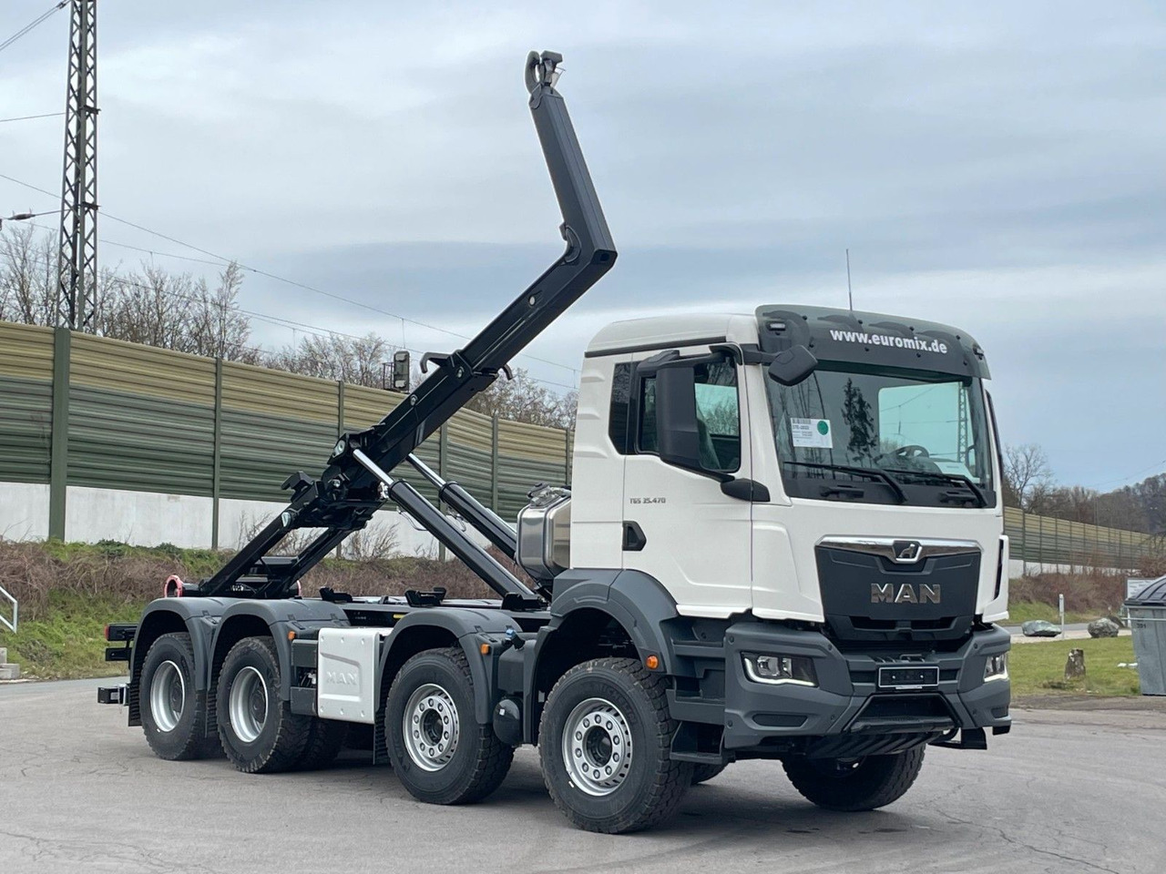 MAN TGS 35.480 8x4 Euro6e Hiab MultLift Abrollkipper - Гаковий мультиліфт вантажівка, Вантажівка з маніпулятором: фото 1 MAN TGS 35.480 8x4 Euro6e Hiab MultLift Abrollkipper - Гаковий мультиліфт вантажівка, Вантажівка з маніпулятором: фото 1