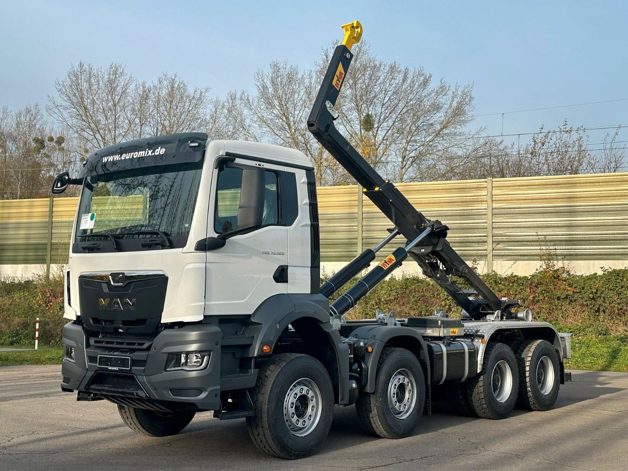 MAN TGS 35.520 8x4 Euro6e Hyva 26-55 Abrollkipper - Гаковий мультиліфт вантажівка: фото 1 MAN TGS 35.520 8x4 Euro6e Hyva 26-55 Abrollkipper - Гаковий мультиліфт вантажівка: фото 1