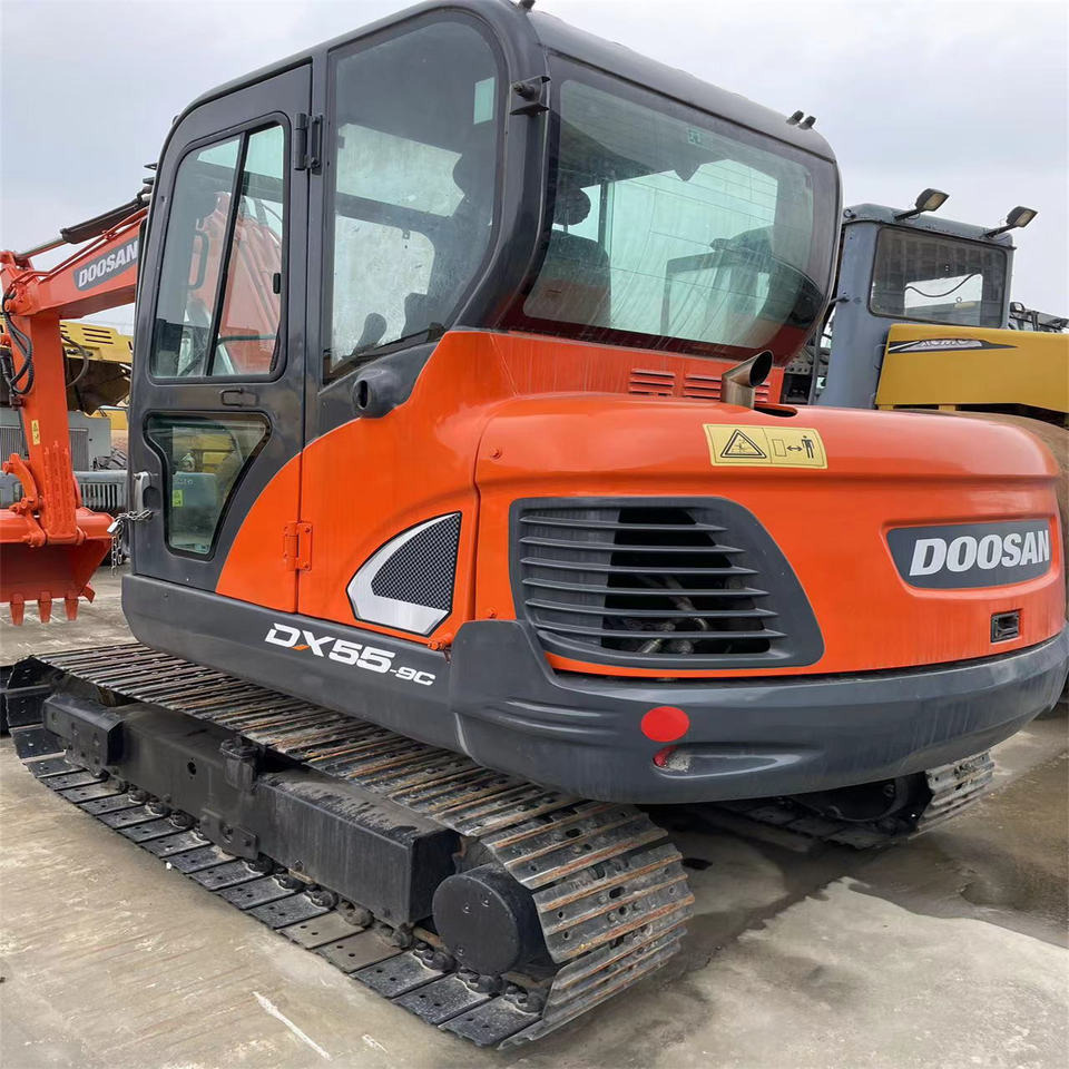 Original Color Used Doosan Dx55 Mini Excavator Used 5 Ton 5.5ton Mini Doosan Excavator for Sale Used Doosan Dx55-9c - Міні-екскаватор: фото 1 Original Color Used Doosan Dx55 Mini Excavator Used 5 Ton 5.5ton Mini Doosan Excavator for Sale Used Doosan Dx55-9c - Міні-екскаватор: фото 1