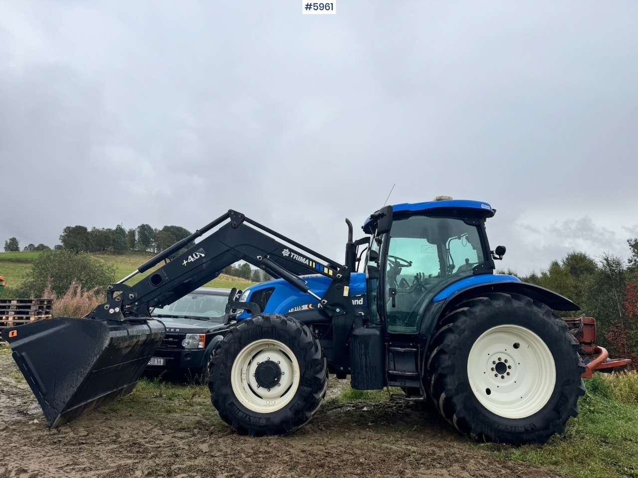 2004 New Holland TS115A with front loader - Трактор: фото 1 2004 New Holland TS115A with front loader - Трактор: фото 1