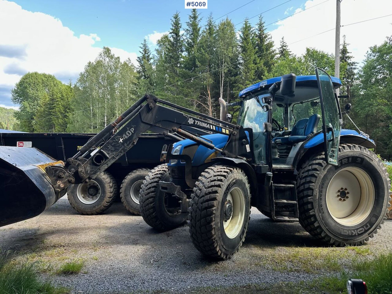 2009 New Holland T6040 SS w/ Trima front loader - Трактор: фото 1 2009 New Holland T6040 SS w/ Trima front loader - Трактор: фото 1