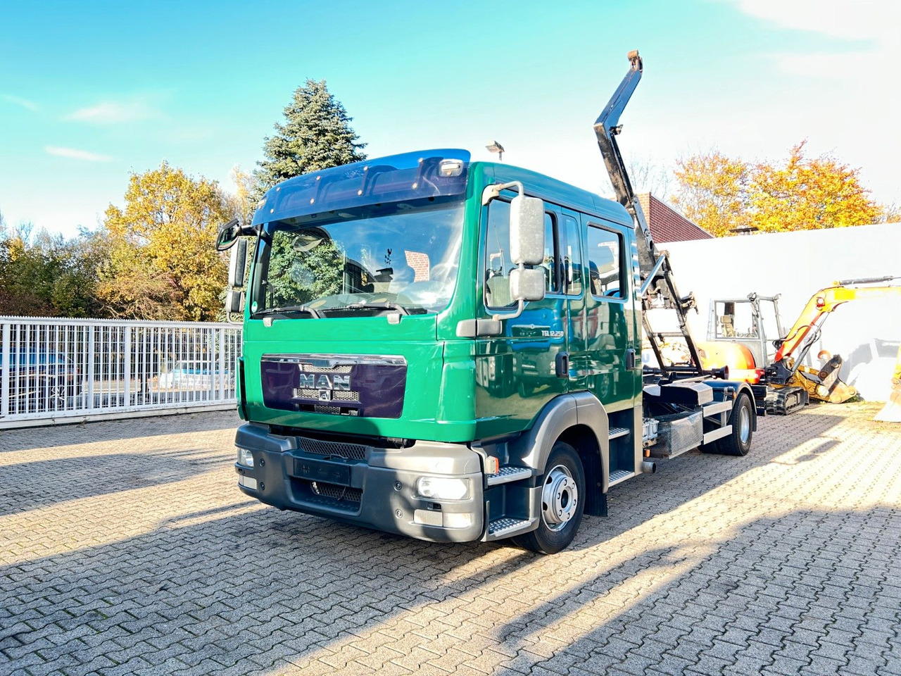 MAN 12.250 Doppelkabine Abroller - Гаковий мультиліфт вантажівка: фото 1 MAN 12.250 Doppelkabine Abroller - Гаковий мультиліфт вантажівка: фото 1