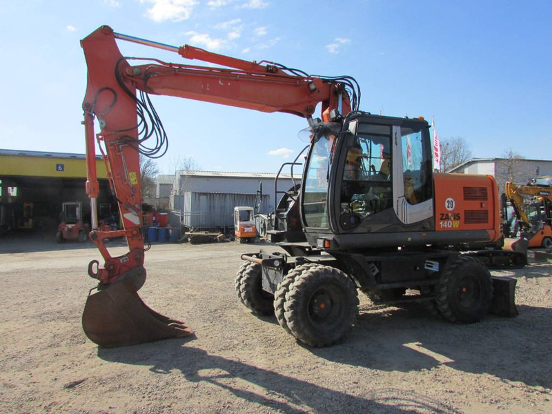 Hitachi ZX 140 W-3 Mobilbagger 45.000 EUR / Klima - Колісний екскаватор: фото 1 Hitachi ZX 140 W-3 Mobilbagger 45.000 EUR / Klima - Колісний екскаватор: фото 1