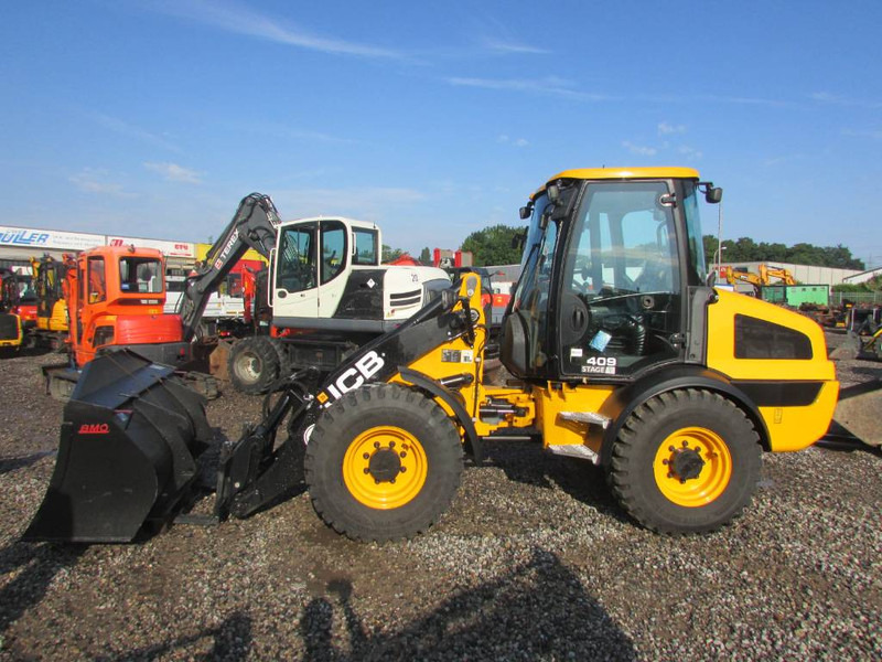 JCB 409 Radlader 46.500 EUR - Колісний навантажувач: фото 1 JCB 409 Radlader 46.500 EUR - Колісний навантажувач: фото 1