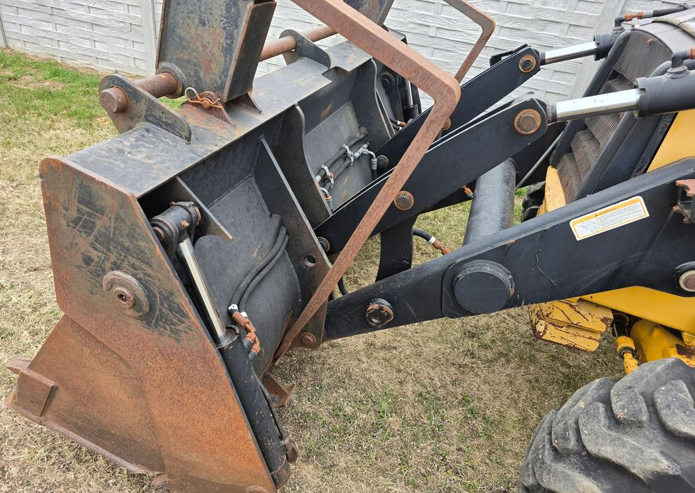 Caterpillar - Екскаватор-навантажувач: фото 5 Caterpillar - Екскаватор-навантажувач: фото 5