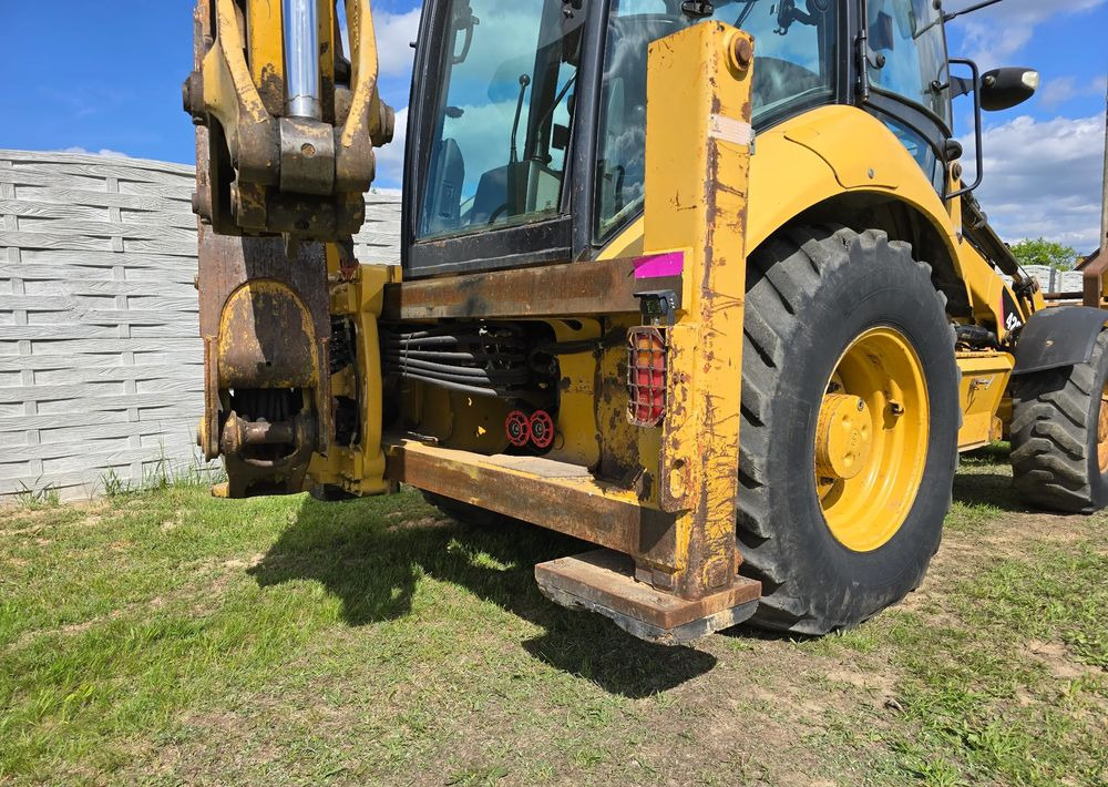 Caterpillar - Екскаватор-навантажувач: фото 4 Caterpillar - Екскаватор-навантажувач: фото 4