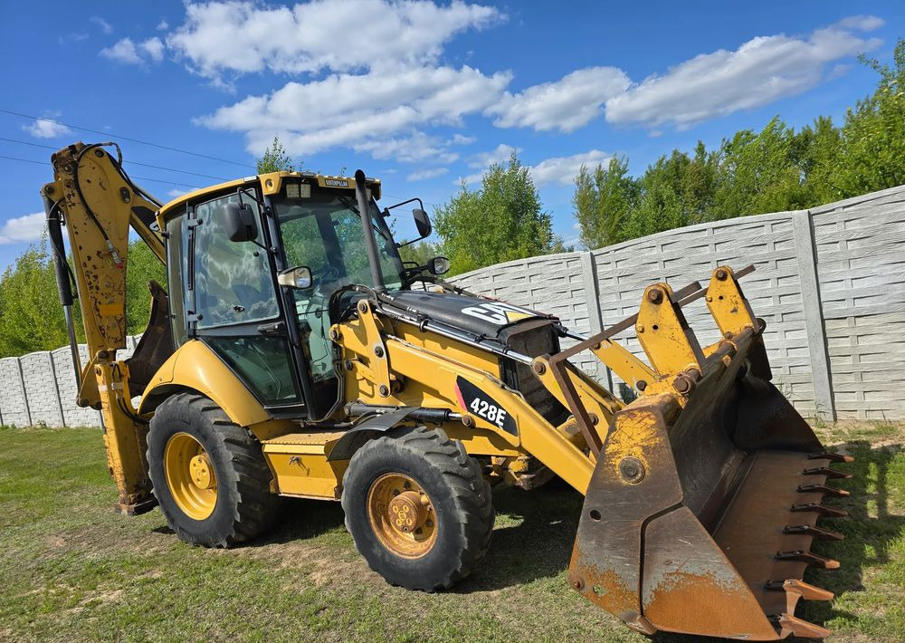 Caterpillar - Екскаватор-навантажувач: фото 2 Caterpillar - Екскаватор-навантажувач: фото 2