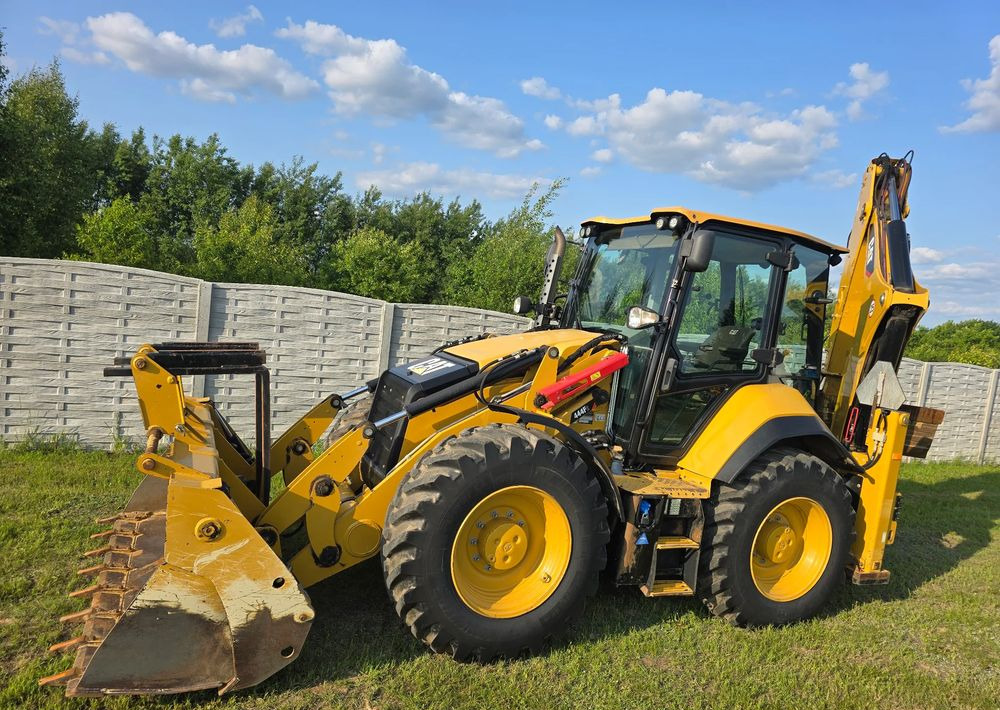 Caterpillar - Екскаватор-навантажувач: фото 3 Caterpillar - Екскаватор-навантажувач: фото 3