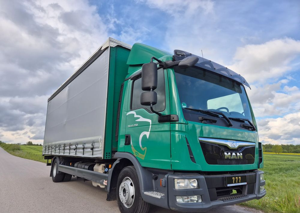 MAN TGL 12.250 6.2m AUTOMAT KLIMA z Niemiec ESP nowe opony EURO 6 / 4.75 rozstaw / zawiesie na wózek widłowy / TOP STAN / okazja nauka jazdy MOŻLIWOŚĆ DOSTOSOWANIA 12t - Тентована вантажівка: фото 1 MAN TGL 12.250 6.2m AUTOMAT KLIMA z Niemiec ESP nowe opony EURO 6 / 4.75 rozstaw / zawiesie na wózek widłowy / TOP STAN / okazja nauka jazdy MOŻLIWOŚĆ DOSTOSOWANIA 12t - Тентована вантажівка: фото 1