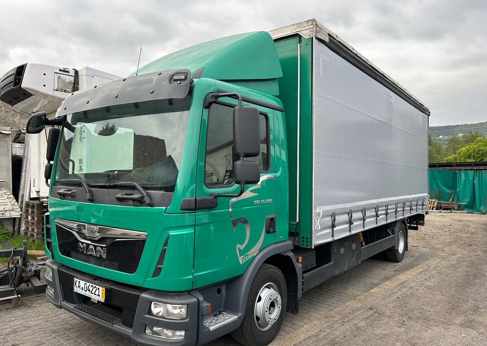 MAN TGL 12.250 6.2m AUTOMAT KLIMA z Niemiec ESP nowe opony EURO 6 / 4.75 rozstaw / zawiesie na wózek widłowy / TOP STAN / okazja nauka jazdy MOŻLIWOŚĆ DOSTOSOWANIA 12t - Тентована вантажівка: фото 1 MAN TGL 12.250 6.2m AUTOMAT KLIMA z Niemiec ESP nowe opony EURO 6 / 4.75 rozstaw / zawiesie na wózek widłowy / TOP STAN / okazja nauka jazdy MOŻLIWOŚĆ DOSTOSOWANIA 12t - Тентована вантажівка: фото 1