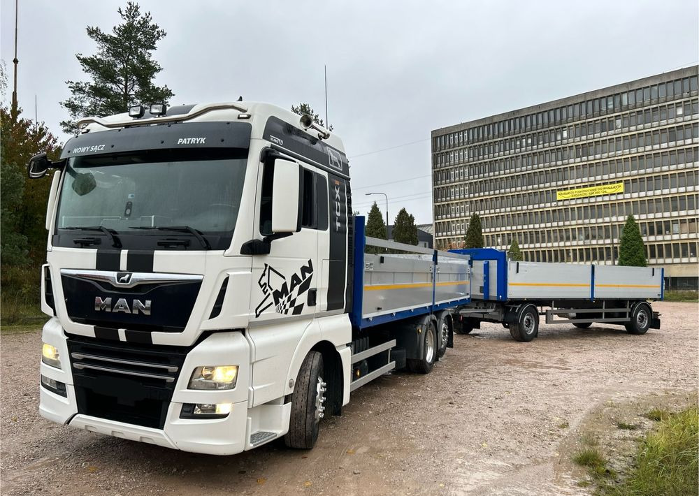 MAN TGX Tandem 1m burty TOP KOMPLET / ALUFELGI / zarejestrowany gotowy do pracy / przyczepa 18t / FULL OPCJA / 26.420 26.460 26.500 26.400 26.440 26.480 26.510 460 500 - Бортова вантажівка/ Платформа: фото 1 MAN TGX Tandem 1m burty TOP KOMPLET / ALUFELGI / zarejestrowany gotowy do pracy / przyczepa 18t / FULL OPCJA / 26.420 26.460 26.500 26.400 26.440 26.480 26.510 460 500 - Бортова вантажівка/ Платформа: фото 1