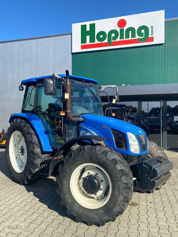New Holland TL90A - Трактор: фото 1 New Holland TL90A - Трактор: фото 1