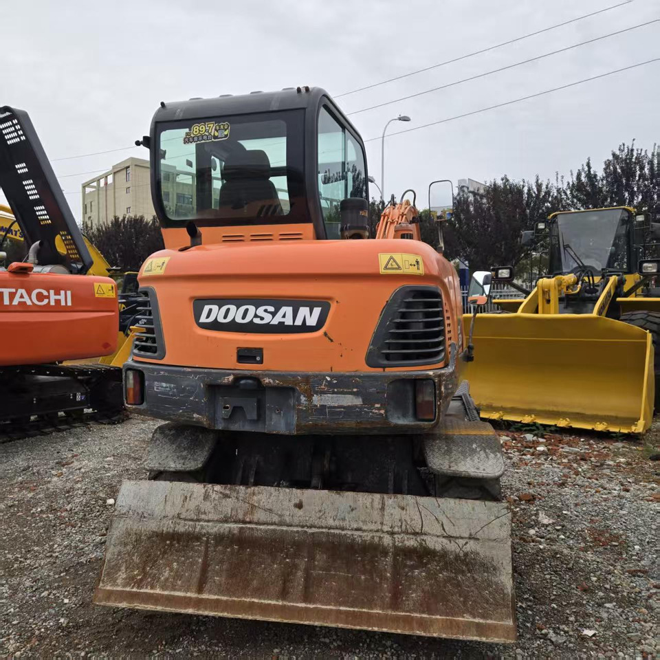DOOSAN DX60W - Колісний екскаватор: фото 4 DOOSAN DX60W - Колісний екскаватор: фото 4