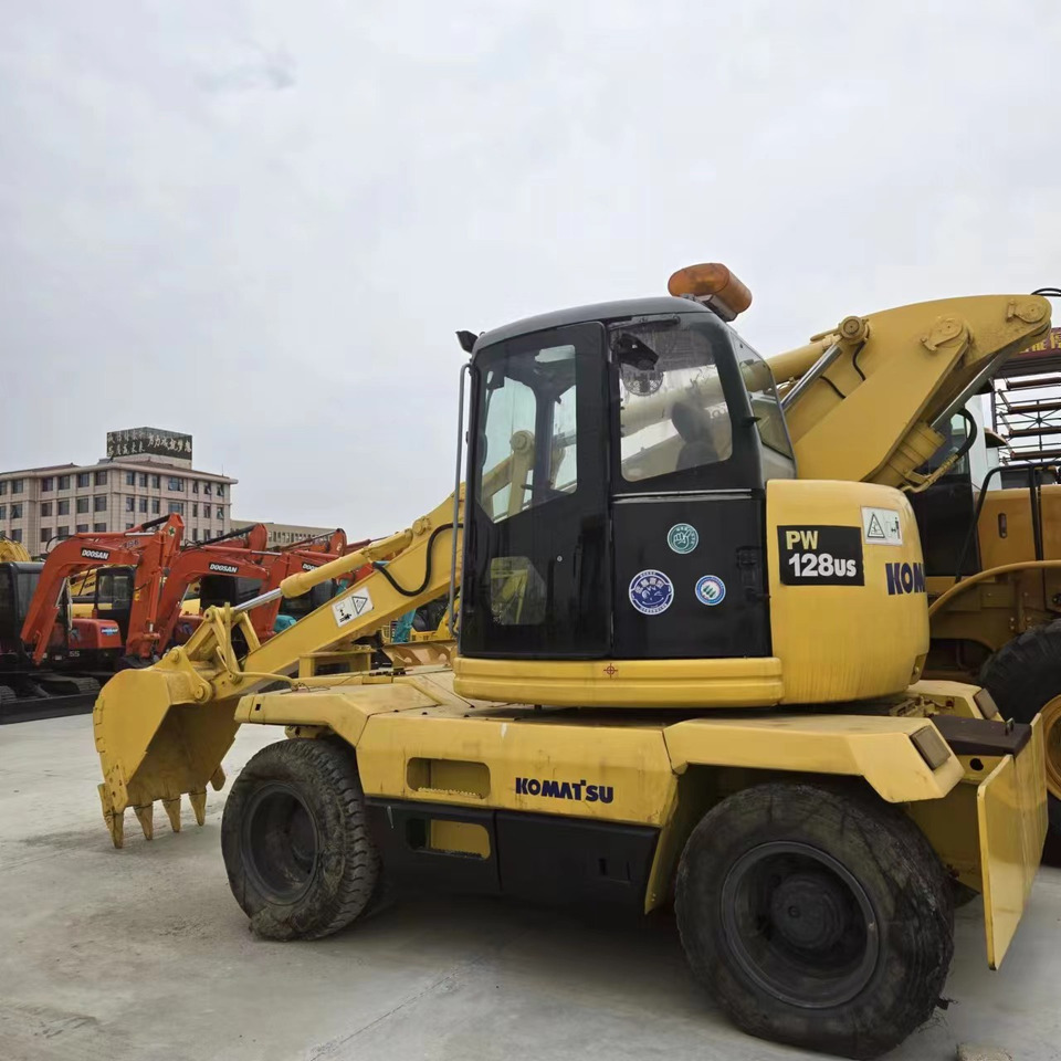 KOMATSU PC128US - Колісний екскаватор: фото 3 KOMATSU PC128US - Колісний екскаватор: фото 3