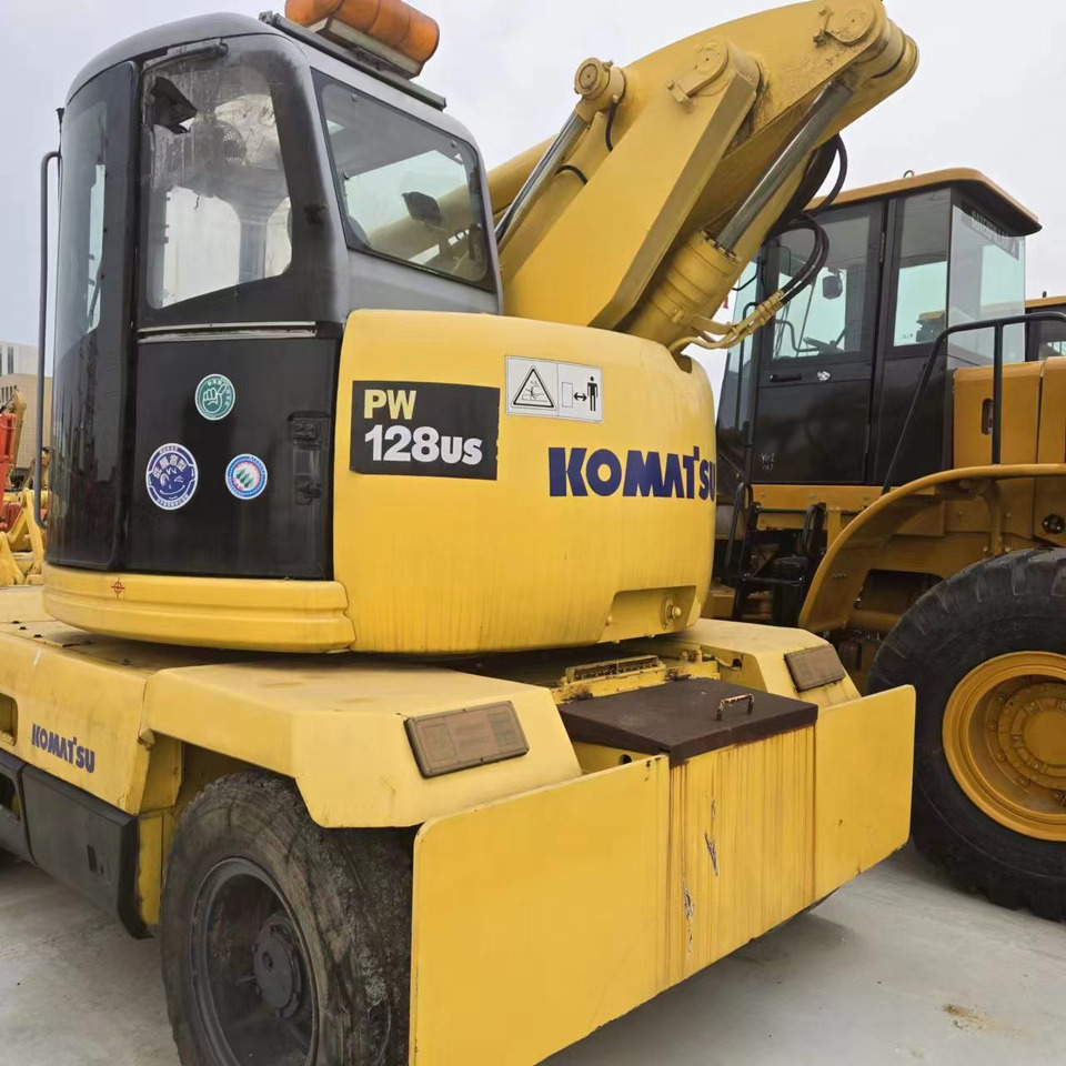 KOMATSU PC128US - Колісний екскаватор: фото 4 KOMATSU PC128US - Колісний екскаватор: фото 4