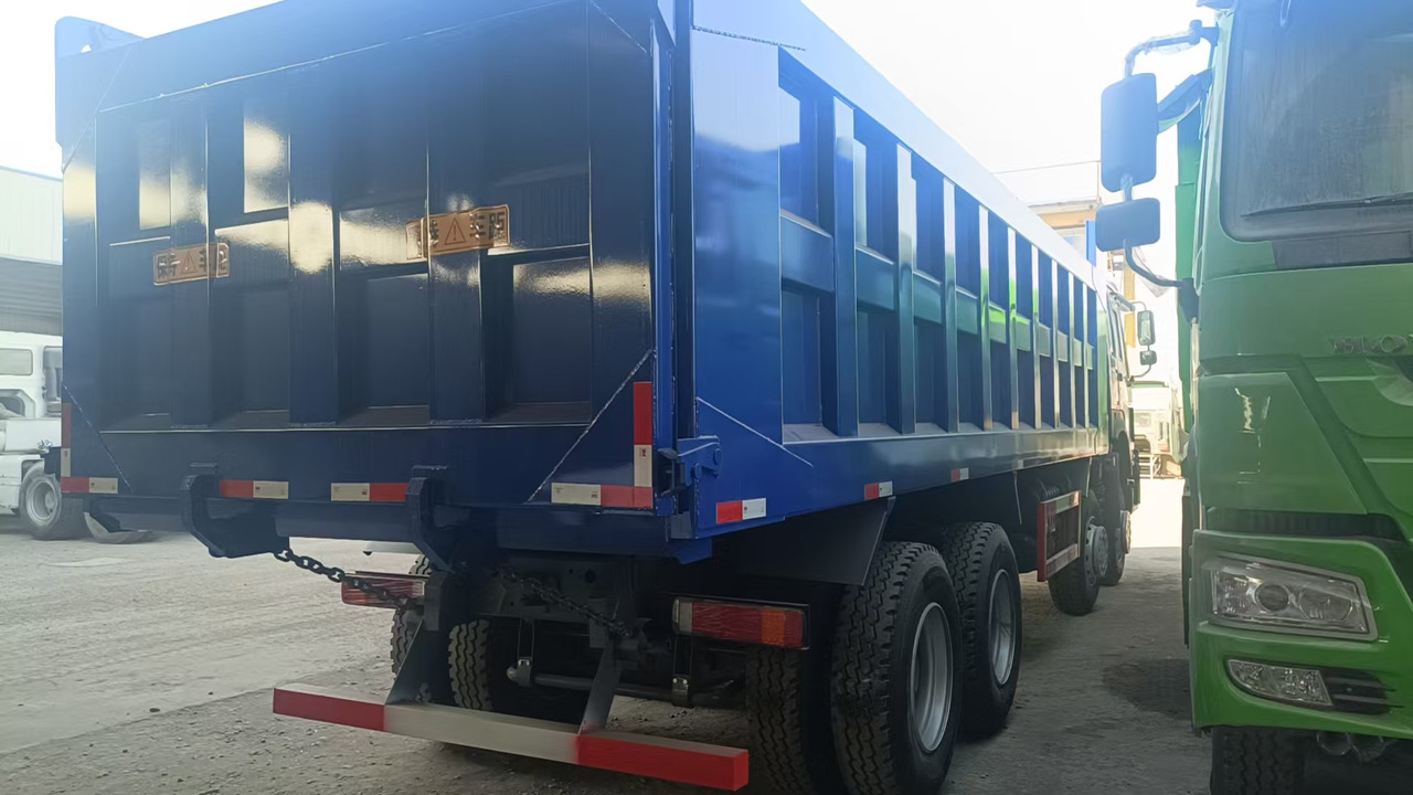 SINOTRUK HOWO 8x4 - Самоскид вантажівка: фото 2 SINOTRUK HOWO 8x4 - Самоскид вантажівка: фото 2
