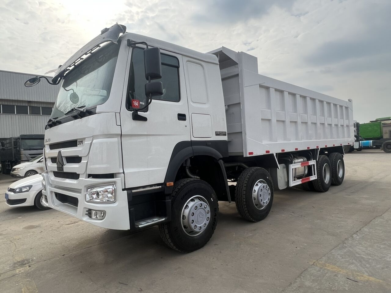 Sinotruk Howo 8*4 - Самоскид вантажівка: фото 5 Sinotruk Howo 8*4 - Самоскид вантажівка: фото 5