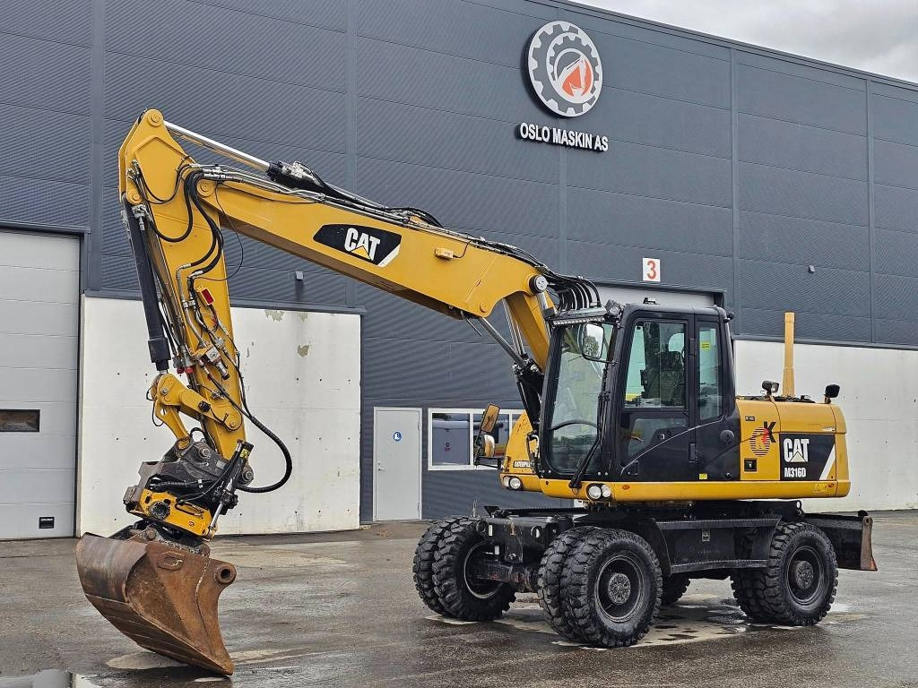 CAT M 316 D - Колісний екскаватор: фото 1 CAT M 316 D - Колісний екскаватор: фото 1