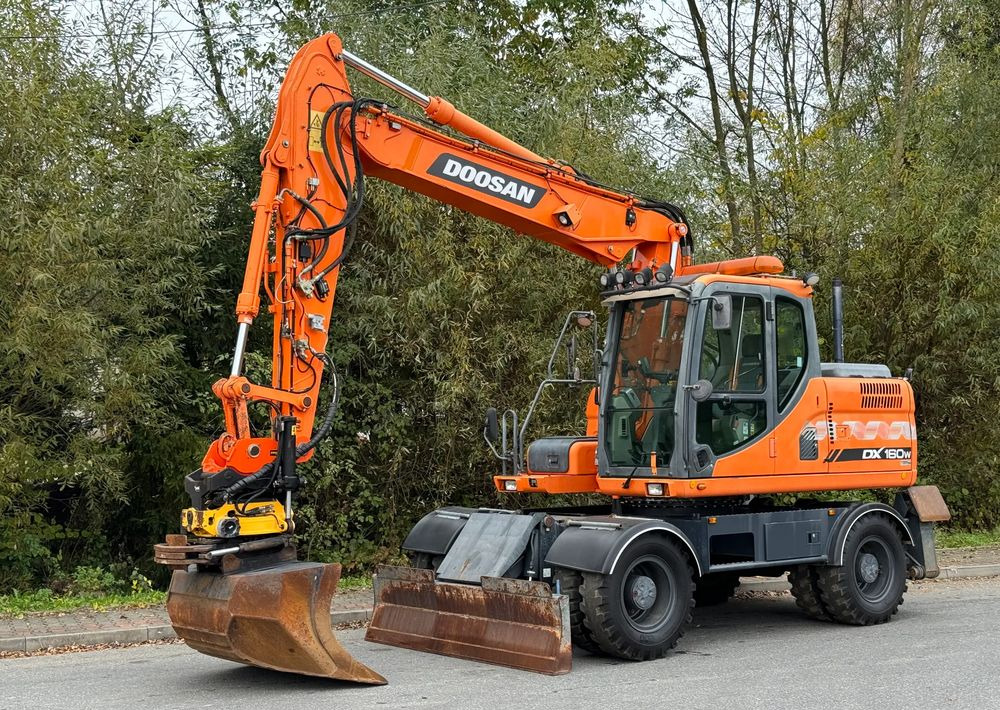 Doosan * DOOSAN DX160W *ROTOTILT* GPS 2D Leica * Sprowadzona * Stan Perfekcyjny * Koparka Kołowa * - Колісний екскаватор: фото 1 Doosan * DOOSAN DX160W *ROTOTILT* GPS 2D Leica * Sprowadzona * Stan Perfekcyjny * Koparka Kołowa * - Колісний екскаватор: фото 1