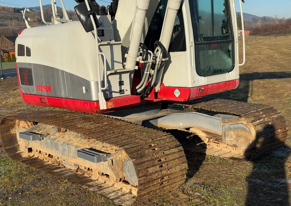 Takeuchi KOPARKA TAKEUCHI TB2150R 5100 MTH SPROWADZONA STAN PERFEKCYJNY - Гусеничний екскаватор: фото 4 Takeuchi KOPARKA TAKEUCHI TB2150R 5100 MTH SPROWADZONA STAN PERFEKCYJNY - Гусеничний екскаватор: фото 4