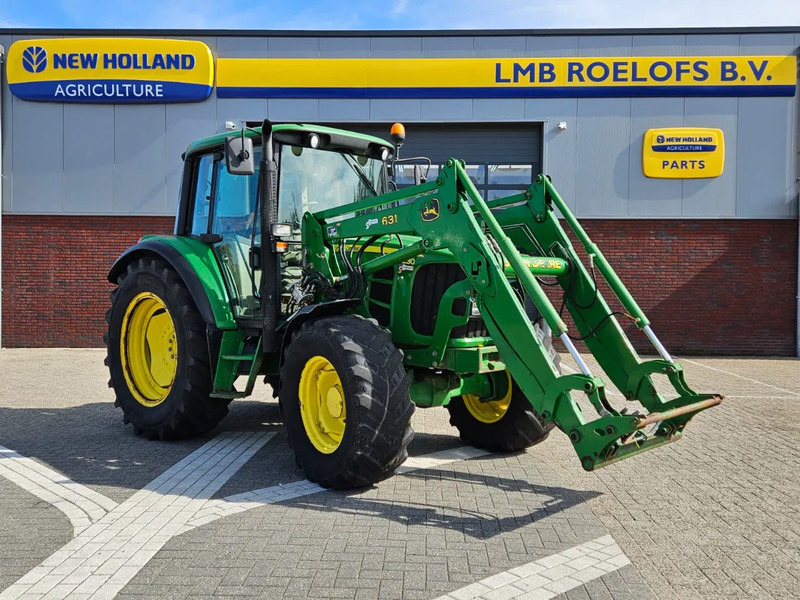 John Deere met 631 voorlader 6230 - Трактор: фото 1 John Deere met 631 voorlader 6230 - Трактор: фото 1