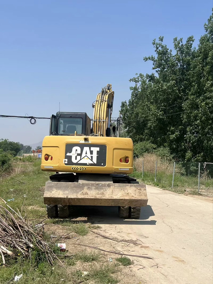 CATERPILLAR M317D2 - Колісний екскаватор: фото 1 CATERPILLAR M317D2 - Колісний екскаватор: фото 1