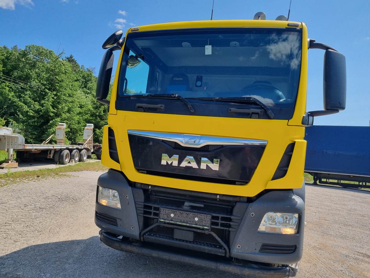 MAN TGS 33.480 6x4 ABROLLKIPPER HIAB Multilift 18 T - Гаковий мультиліфт вантажівка: фото 2 MAN TGS 33.480 6x4 ABROLLKIPPER HIAB Multilift 18 T - Гаковий мультиліфт вантажівка: фото 2