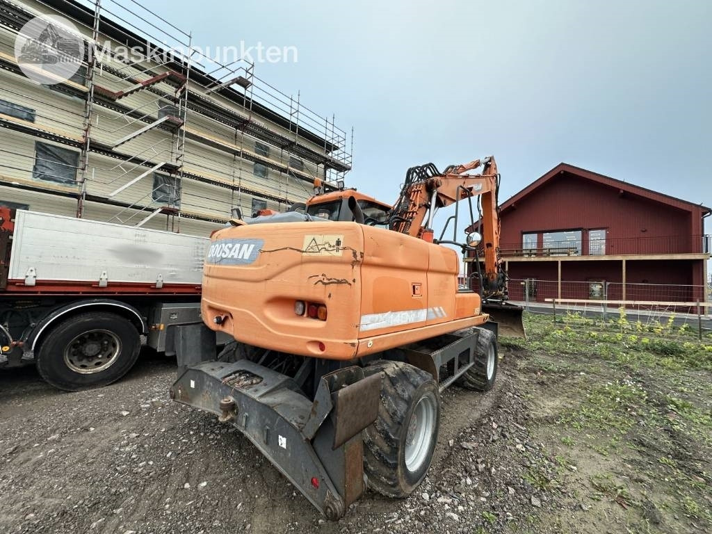 Doosan DX 140 W med vagn och redskap - Колісний екскаватор: фото 4 Doosan DX 140 W med vagn och redskap - Колісний екскаватор: фото 4