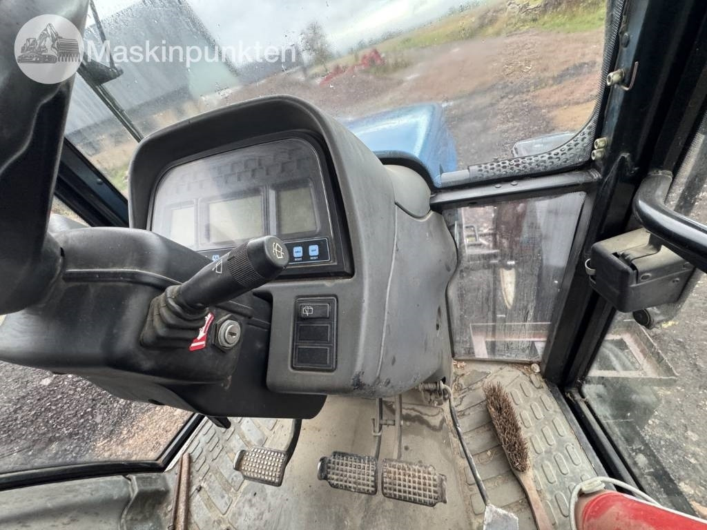 Трактор New Holland 8560: фото 30