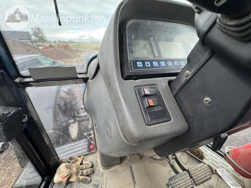 Трактор New Holland 8560: фото 29