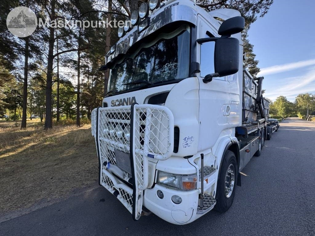Scania R 560 LB - Скіповий навантажувач вантажівка: фото 1 Scania R 560 LB - Скіповий навантажувач вантажівка: фото 1