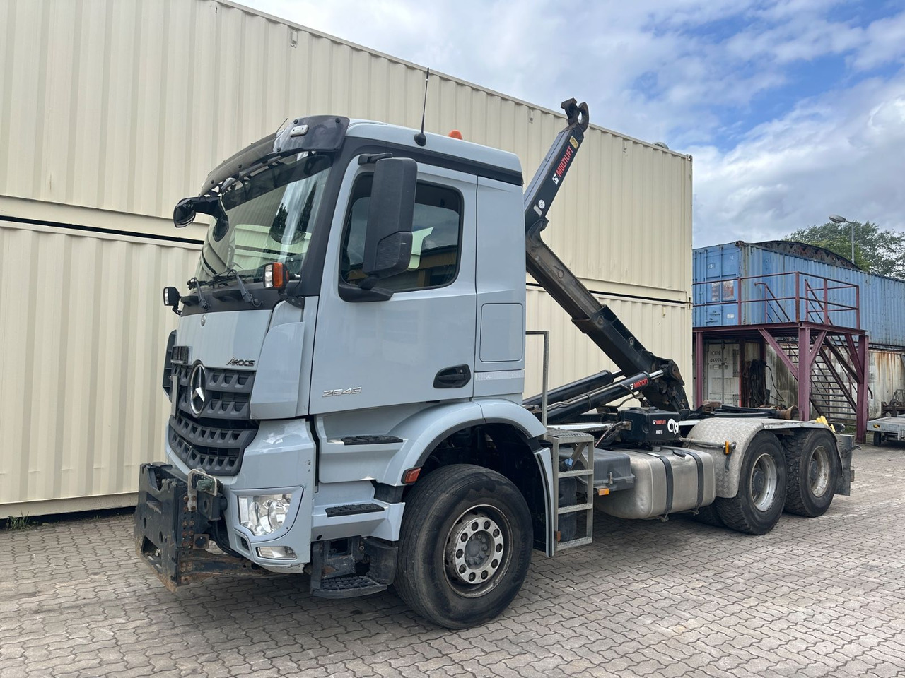 Mercedes-Benz Arocs 2643/Hiab M. /1. Hd /R.St. 3.90m/265.773KM - Гаковий мультиліфт вантажівка: фото 1 Mercedes-Benz Arocs 2643/Hiab M. /1. Hd /R.St. 3.90m/265.773KM - Гаковий мультиліфт вантажівка: фото 1