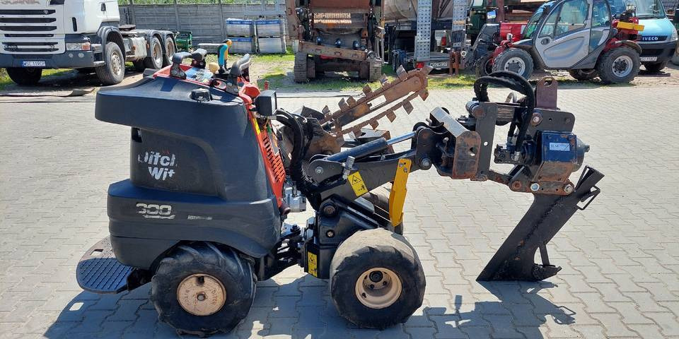 Ditch Witch R300 koparka łańcuchowa pługoukładacz - Траншеєкопач: фото 5 Ditch Witch R300 koparka łańcuchowa pługoukładacz - Траншеєкопач: фото 5