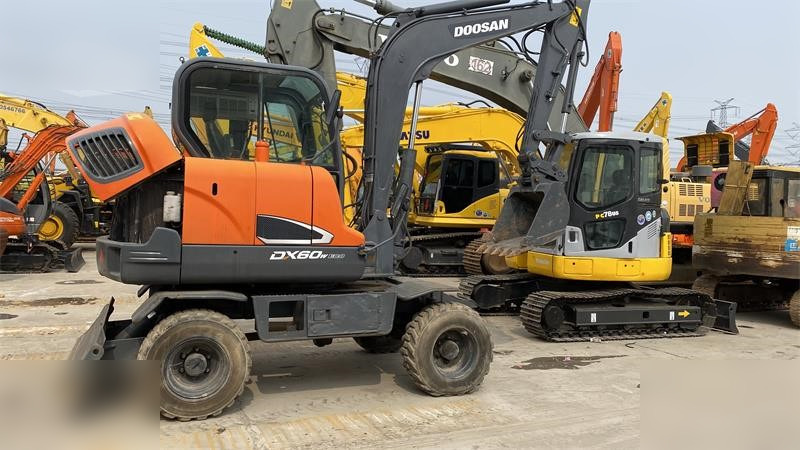 DOOSAN DX60W ECO - Колісний екскаватор: фото 1 DOOSAN DX60W ECO - Колісний екскаватор: фото 1
