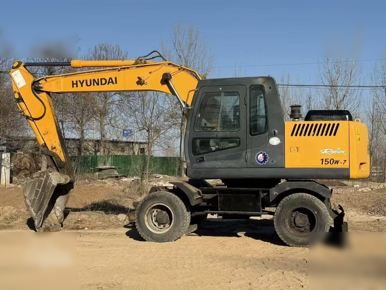 HYUNDAI ROBEX 150W-7A - Колісний екскаватор: фото 1 HYUNDAI ROBEX 150W-7A - Колісний екскаватор: фото 1