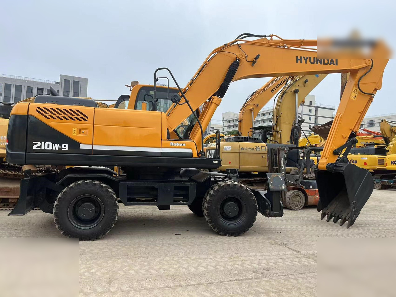 HYUNDAI ROBEX 210W-9 - Колісний екскаватор: фото 1 HYUNDAI ROBEX 210W-9 - Колісний екскаватор: фото 1