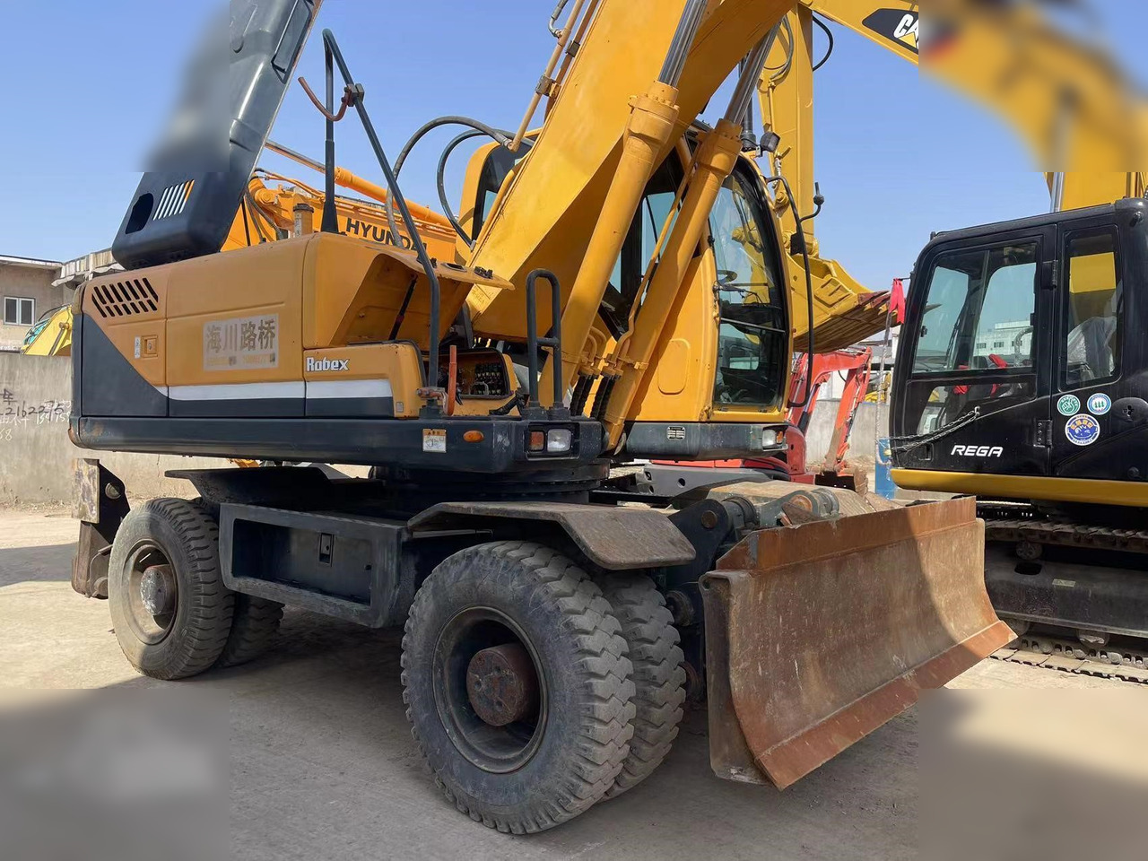 HYUNDAI ROBEX 210W-9 - Колісний екскаватор: фото 2 HYUNDAI ROBEX 210W-9 - Колісний екскаватор: фото 2