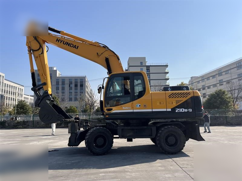 HYUNDAI ROBEX 210W-9 - Колісний екскаватор: фото 1 HYUNDAI ROBEX 210W-9 - Колісний екскаватор: фото 1